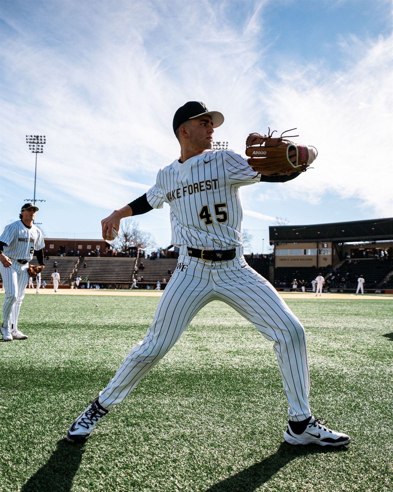 Dylan Zucker throwing on the Wake Forest baseball field